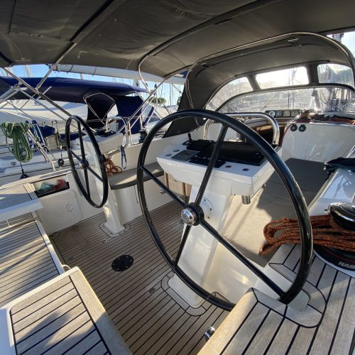 Two GS Composite carbon steering wheels installed in the cockpit of a sailing yacht